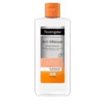 Flacon de NEUTROGENA Anti-points noirs : lotion désincrustant à L'acide Salicylique avec bouchon orange et étiquette, disponible chez Univers Cosmetix, Dakar.