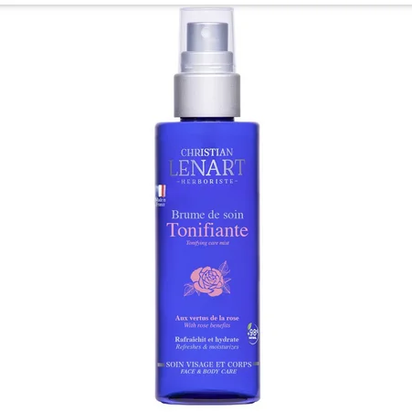 Flacon pulvérisateur bleu de Christian Lenart Brume Tonifiante Brume Minérale 150 ml pour le visage et le corps, aux extraits de rose.