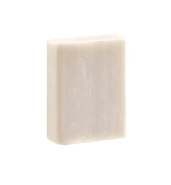 Une barre beige de MKL Shampooing solide Aloe vera - 65 g aux surfaces lisses et planes sur fond blanc uni souligne l'excellence de la qualité reconnue d'Univers Cosmetix.