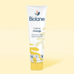Biolane Crème change Bébé Tube 100 ml sur fond jaune, avec texte indiquant qu'elle répare et protège la peau ; 98% d'origine naturelle. Disponible pas cher à Dakar et dans tout le Sénégal.