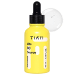 Un flacon jaune vif de Tiam Vita B3 Source Sérum 10 % Niacinamide, 2 % Arbutine Anti-Taches 40 ml avec un bouchon compte-gouttes noir, contenant 40 ml (1,35 fl. oz) de Niacinamide, offrant la qualité à un prix pas cher.