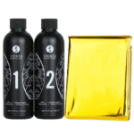 Deux flacons noirs étiquetés « 1 » et « 2 » avec le texte « Shunga Gelée Massage Érotique Vin Pétillant Fraise 2 x 225 ml », à côté d'un article emballé dans une feuille d'or, mettant en valeur la qualité pour laquelle Univers Cosmetix est connu.