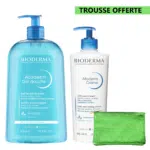 Pack Bioderma Duo Hydratation ATODERM Gel Douche et ATODERM Crème Ultra-Nourrissante en flacons avec une pochette verte et une étiquette "Trousse offerte" en français.