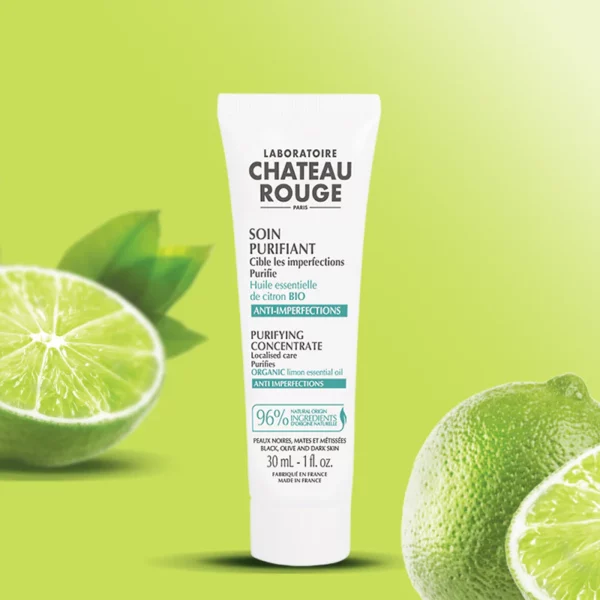 Tube de Chateau Rouge Soin Purifiant Anti-imperfections 30 ml sur fond vert, avec des citrons verts au premier plan. dakar, Sénégal