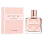 Un flacon de 35 ml de GIVENCHY Irresistible Eau de Parfum pour femme à la teinte rose est posé à côté de sa boîte rose assortie sur fond blanc. dakar, Sénégal