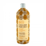 Un flacon de Ht26 WAX Gel Douche Clarifiant Gommant Coco Et Karité 1 L, décoré d'un motif circulaire. dakar, Sénégal