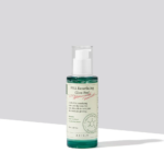 Un flacon de 50 ml d'Axis Y PHA Resurfacing Glow Peel avec un liquide vert et une pompe blanche, sur fond gris clair.