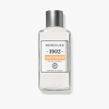 Un flacon d'Eau de Cologne Fleur d'Oranger Berdoues 125 ml présentant un bouchon gris, une étiquette blanche et un accent orange sur fond gris.