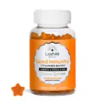 Un flacon de LASHILÉ BEAUTY Good Immunity Boost Défenses immunitaires avec une étiquette orange et un gummy en forme d'étoile devant.