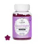 Flacon violet de LASHILE BEAUTY Good Night Endormissement Rapide Sommeil de qualité 60 pièces avec mélatonine, à côté d'une gomme en forme d'étoile, parfaite pour un endormissement rapide et un sommeil de qualité.