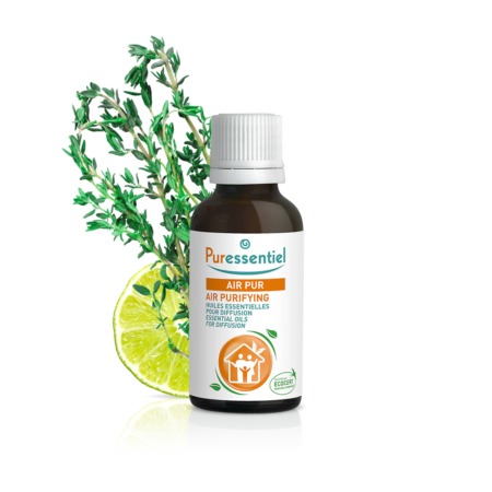 Puressentiel Huile Essentielle Menthe Poivrée BIO Flacon de 30 ml (Copie) avec tranche de citron vert et feuillage en fond.