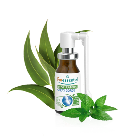 Un flacon de Puressentiel Gommage Express Minceur Zones Rebelles 150 ml, avec des feuilles vertes et des feuilles de menthe en arrière-plan, capturant l'essence de Puressentiel Gommage Express.