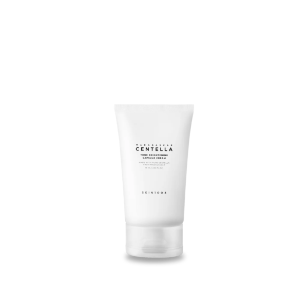 Un tube blanc étiqueté « Skin1004 Tone Brightening Capsule Cream d'équilibrage du tonus de la peau 75 ml » sur un fond blanc immaculé, parfait pour mettre en valeur l'élégance des capsules éclaircissantes de SKIN1004.