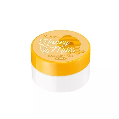 Un petit contenant rond de A’PIEU Honey & Milk Masque Quotidien pour les Lèvres Miel 6g avec un couvercle jaune et une base blanche. dakar, Sénégal