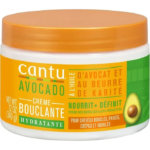 Cantu Crème Bouclante Hydratante à l'Avocat, Pot de 340 g avec couvercle orange, comportant une image d'avocat et un texte d'étiquette en français et en anglais. dakar, Sénégal