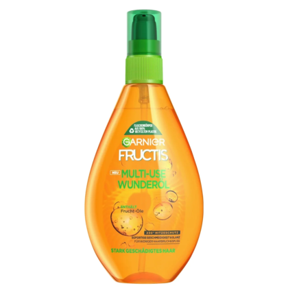 Flacon orange de Garnier FRUCTIS Spray Huile Miracle Protection Solaire Cheveux très Abîmés 150 ml avec une pompe verte, savamment conçue pour le soin des cheveux abîmés. dakar, Sénégal