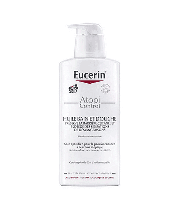 Un flacon d'Eucerin Atopi Control Huile Bain et Douche Peaux Atopiques 400 ml avec un distributeur à pompe blanc