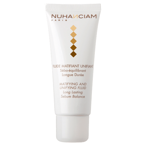 Tube blanc de Nuhanciam Fluide Matifiant Unifiant Longue Durée 40 ml avec symboles et texte dorés