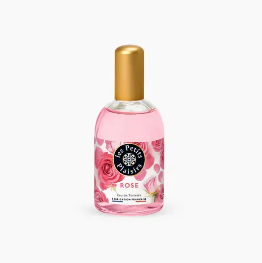 Un flacon de parfum rose intitulé « Les Petits Plaisirs Eau rose 110 ml »