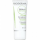 Un tube de Bioderma - Sébium Mat Control - Soin hydratant anti-brillance 8h, 30 ml présente un emballage blanc élégant avec un texte vert et noir qui souligne son adéquation aux peaux sensibles mixtes à grasses, ce qui en fait un choix idéal pour le climat humide de Dakar, au Sénégal. Dakar