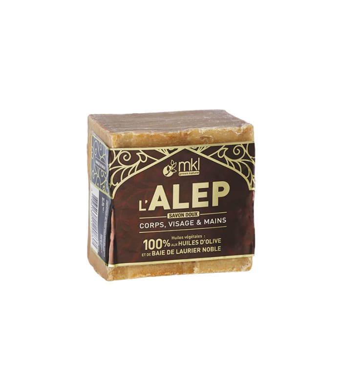 Un bloc de Savon d'Alep MKL 200 g avec une étiquette noire et dorée