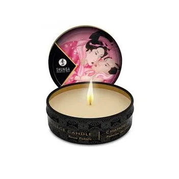 Une Mini Chandelle de Massage Shunga Erotic Art Aphrodisia Pétales de Rose 30 ml dans un récipient rond en étain avec un couvercle représentant une image artistique d'un couple