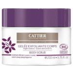 Un pot de 200 ml de gommage corps Cattier Paris avec un couvercle violet. L'étiquette, ornée d'un motif de feuille, mentionne un gel exfoliant corps à l'abricot et aux grains de riz, et met en valeur le parfum pêche-ylang-ylang. Certifié bio par Cosmos. Dakar