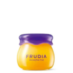 Un petit pot jaune au couvercle violet, étiqueté « FRUDIA » avec la mention « Dérivé de fruits » en dessous. De forme lisse et arrondie, il semble conçu pour un usage cosmétique. Dakar