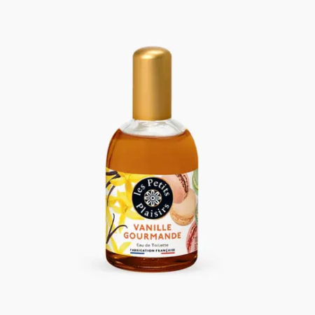 Un flacon d'eau de toilette Vanille Gourmande de Les Petits Plaisirs. L'étiquette est décorée de fleurs, de feuilles et de macarons de vanille. Le bouchon est doré et le parfum est ambré. Dakar