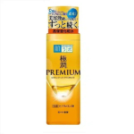 Un flacon de lotion à l'acide hyaluronique Hada Labo Gokujyun Premium. Le flacon est haut et jaune, avec l'inscription « Premium » en japonais en haut et « Premium » en anglais. Le fond est blanc. Dakar