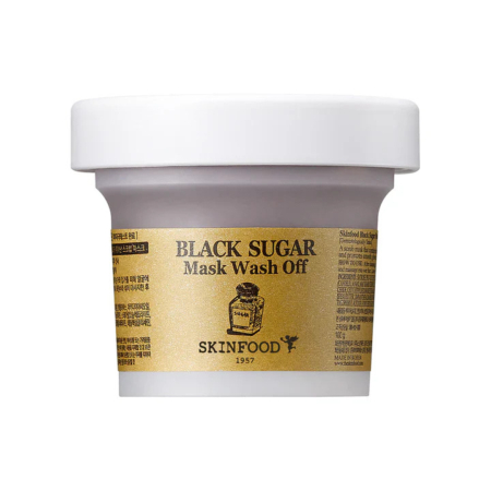 Un pot de masque nettoyant au sucre noir Skinfood. L'emballage est blanc avec une étiquette dorée indiquant le nom du produit et le logo de la marque. Dakar